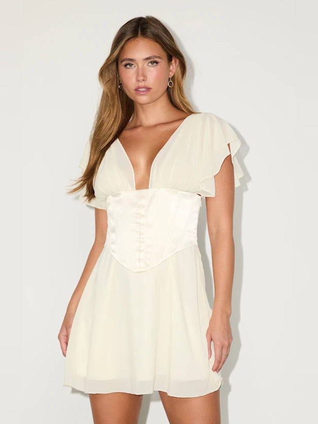 Ivory corset mini dress with V-neck and flutter sleeves, chiffon overlay