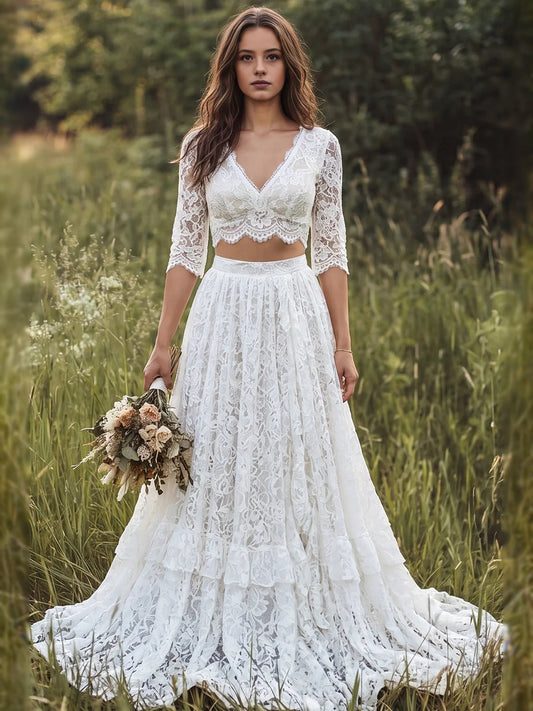 Ivory lace V-neck tiered A-line maxi wedding dress with 3/4 sleeves