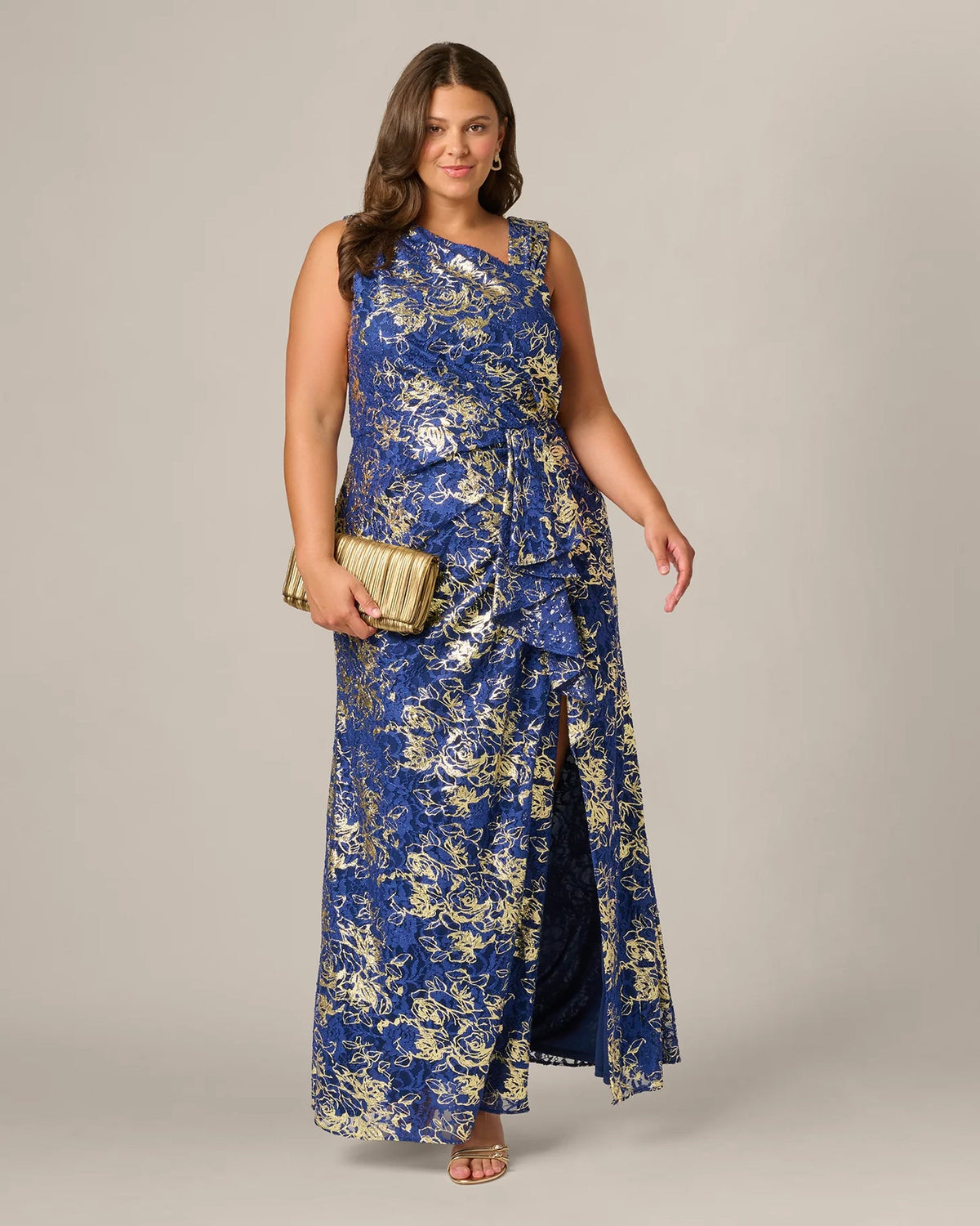 Sleeveless navy-blue maxi dress with draped A-line bodice and gold lace floral pattern