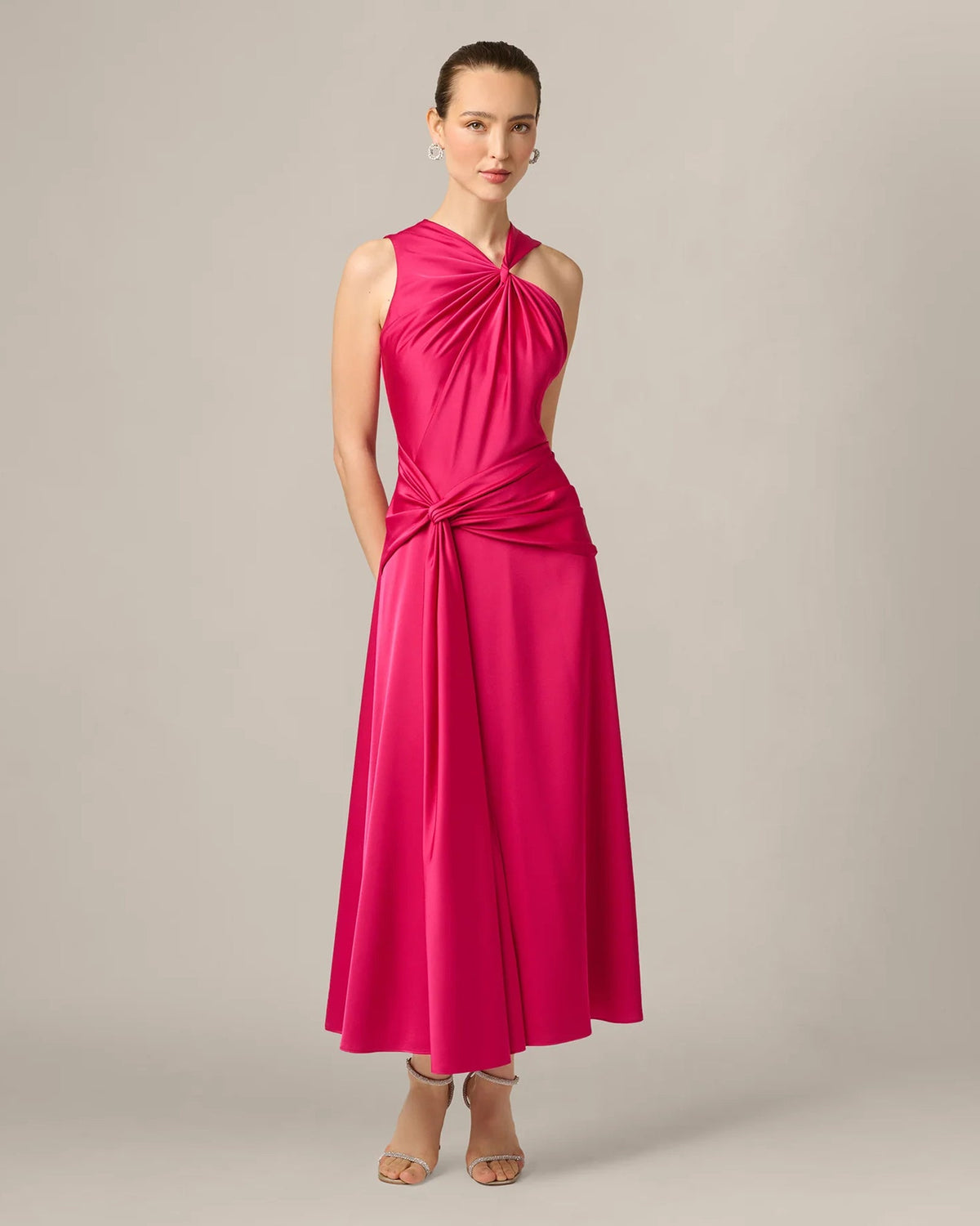 Bright rose draped A-line maxi dress with halter neckline and knot detail