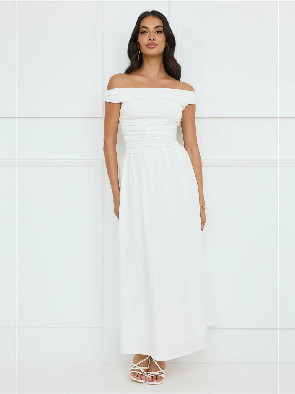 White a-line maxi formal dress with off-the-shoulder neckline, full-length front view
