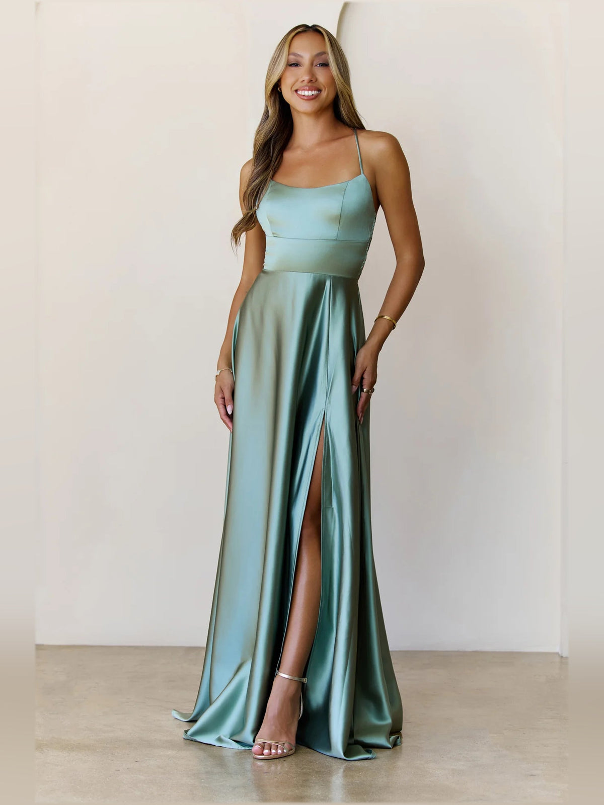 Sage a-line maxi formal dress with V-neckline, full-length front view