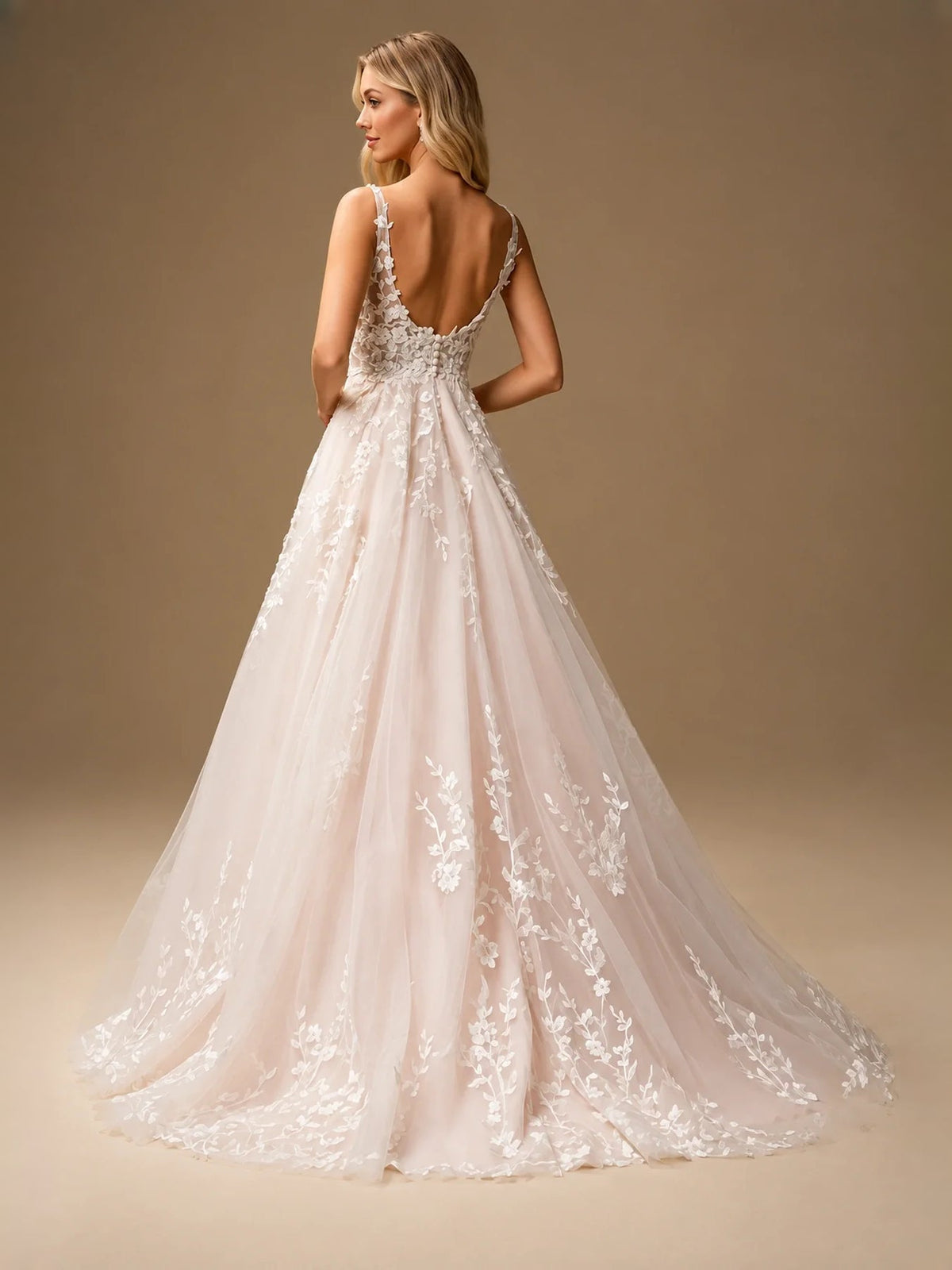 Ivory tulle A-line wedding dress with floral lace open-back bodice