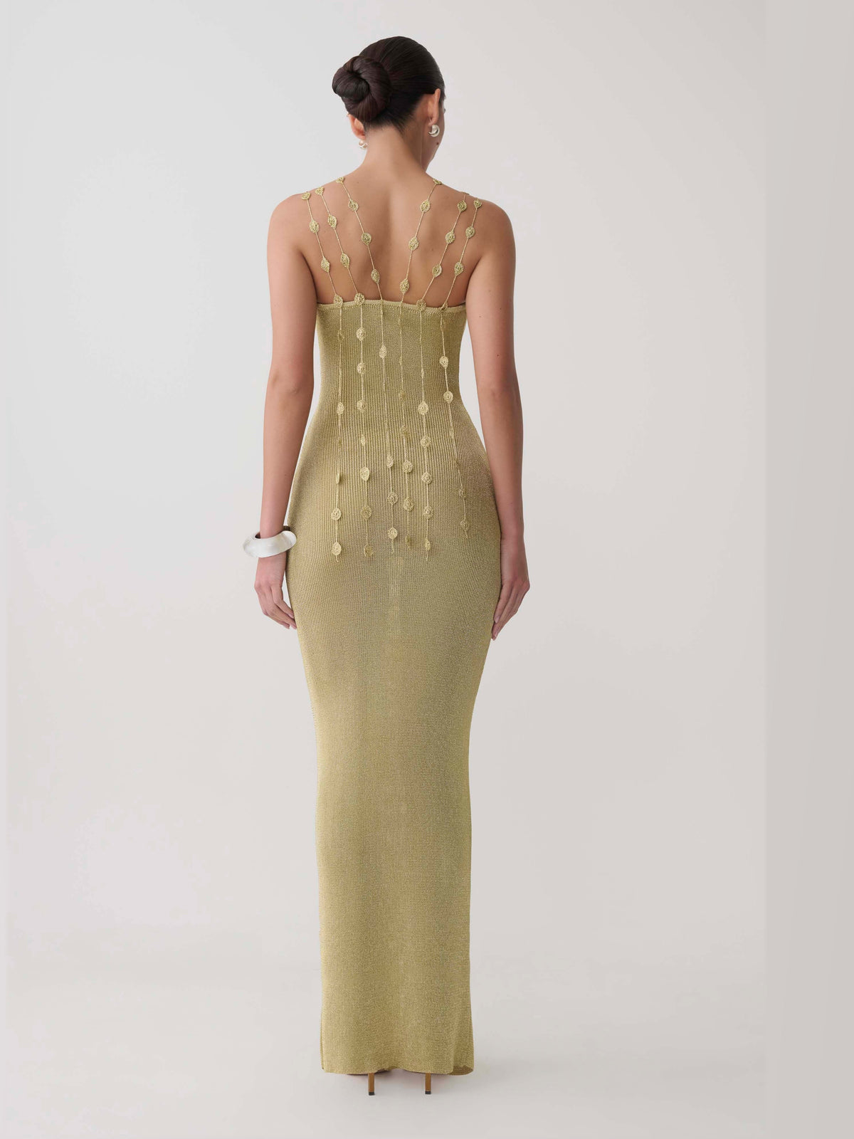 Gold formal dress with a-line silhouette and maxi length