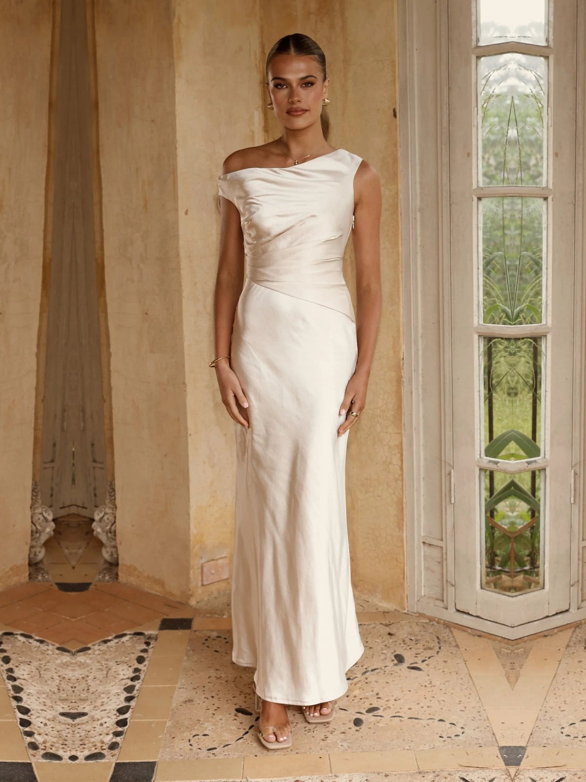 Champagne sheath maxi formal dress with off-the-shoulder neckline, full-length front view