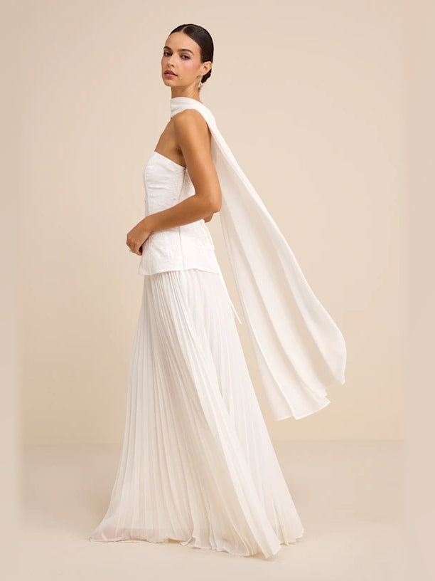 White formal dress with a-line silhouette and maxi length