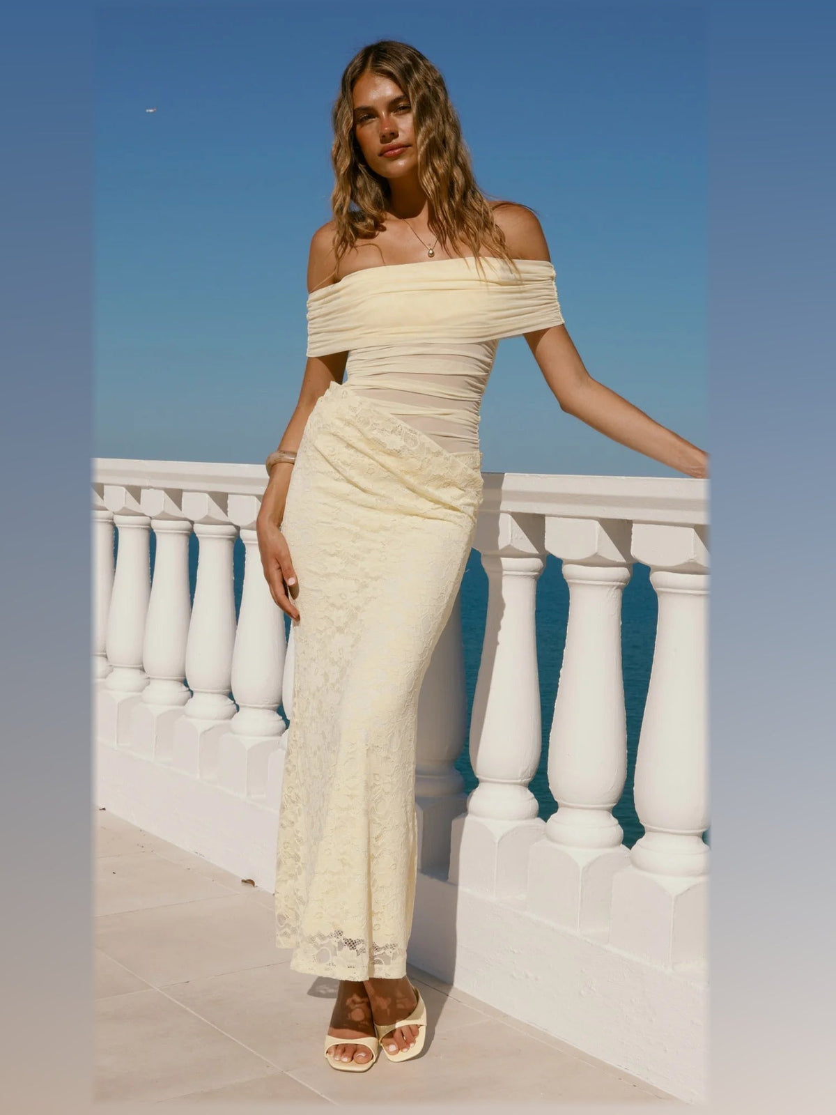 Yellow maxi formal dress, front full-length view showing the neckline