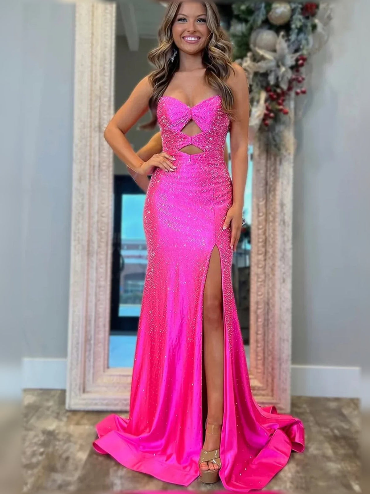 Hot pink sequin sweetheart slit formal dress with cutout bodice and floor length hem