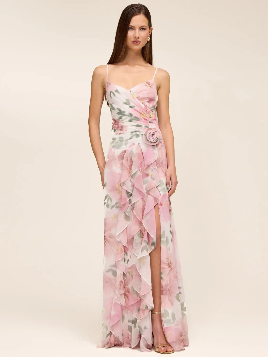 Floral formal dress with square neck, spaghetti straps, and ruffled floor-length skirt