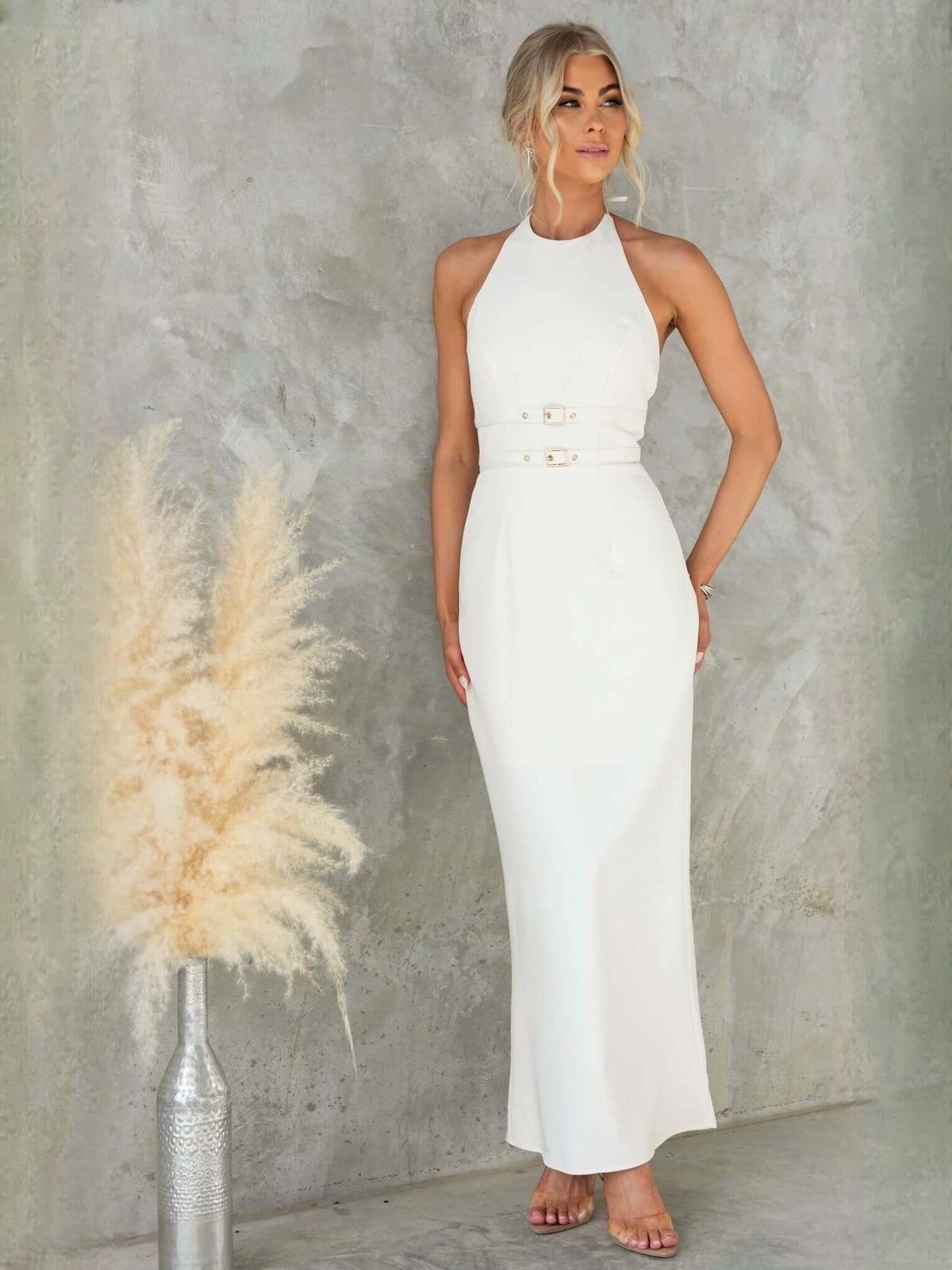 White sheath maxi formal dress with halter neckline, full-length front view