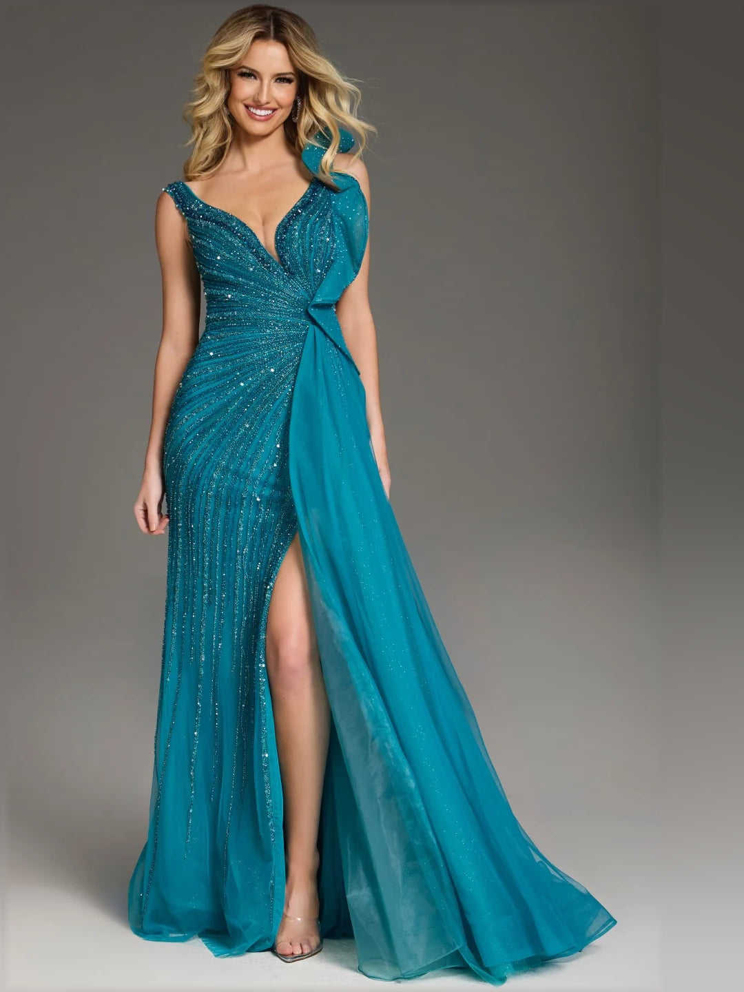 Teal V-neck formal gown with beaded sparkle, ruffled waist, and high slit skirt