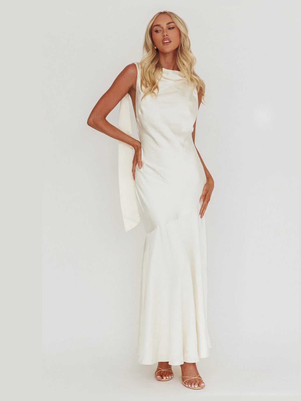 Cream maxi formal dress, front full-length view showing the neckline