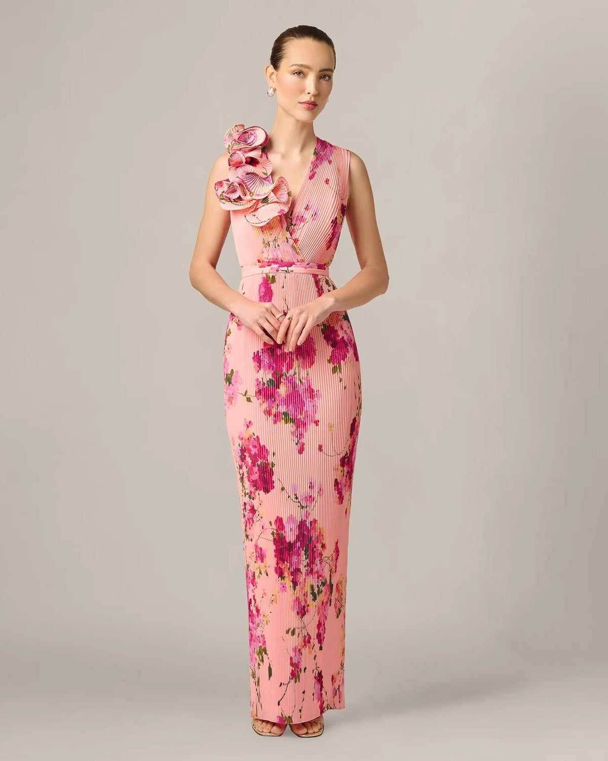 Pink floral sleeveless maxi dress with V-neck, fitted waist and shoulder ruffle