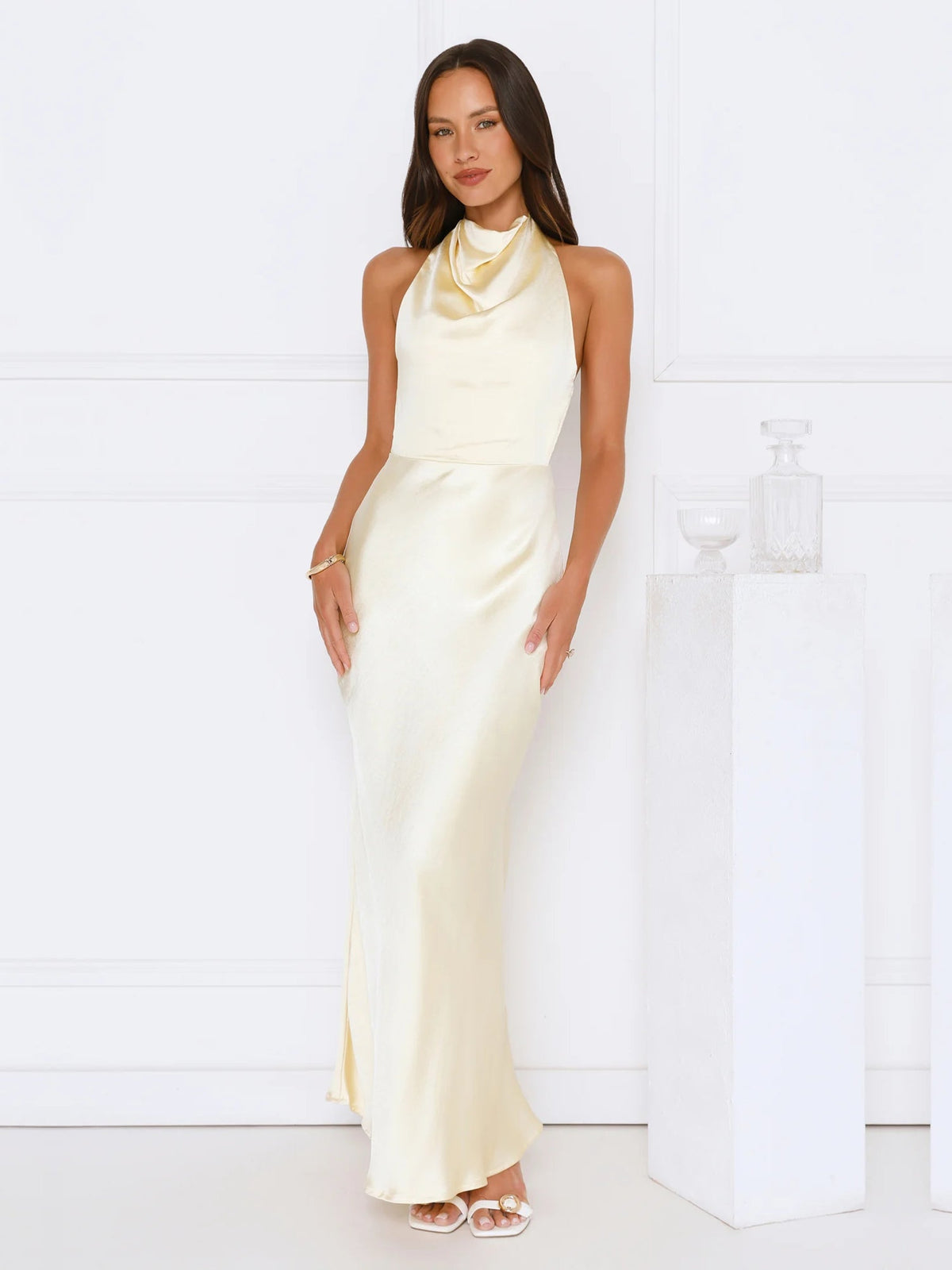 Yellow sheath maxi formal dress with halter neckline, full-length front view