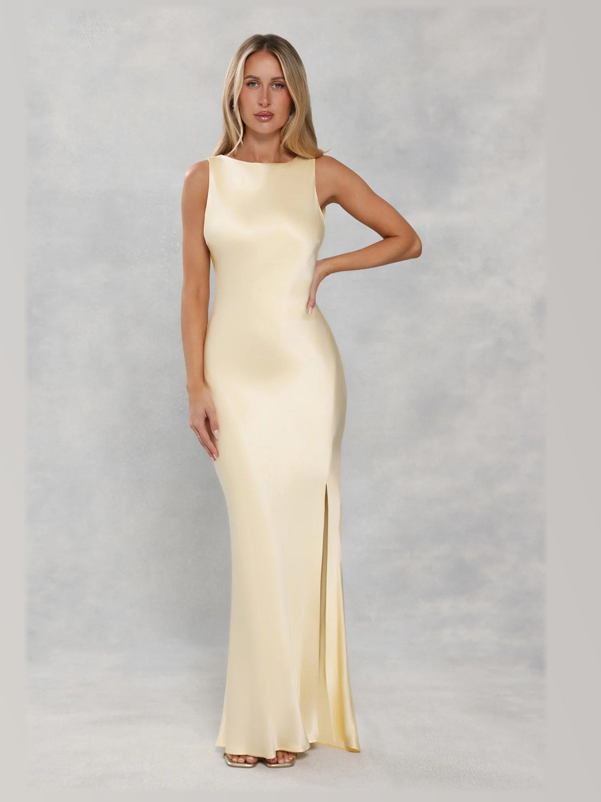 Yellow formal dress with a-line silhouette and maxi length