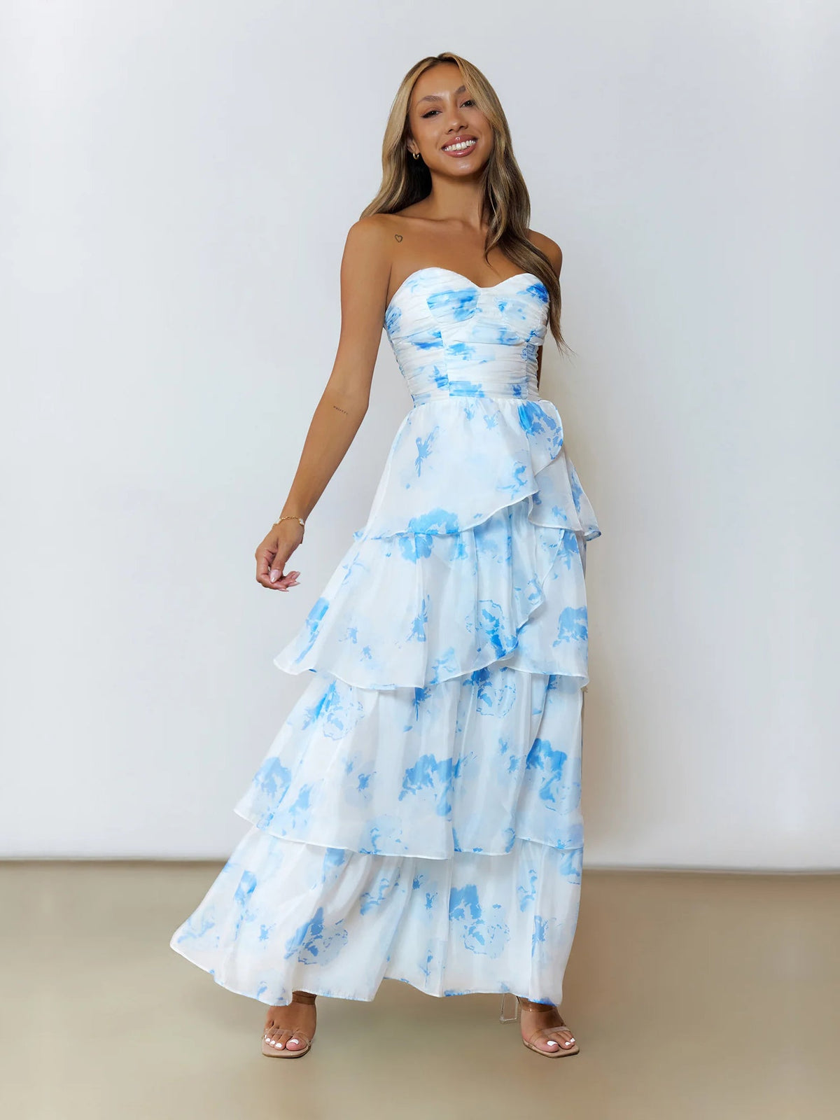 Blue a-line maxi formal dress with strapless neckline, full-length front view
