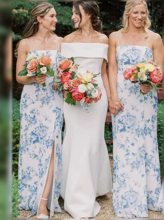 Blue floral strapless bridesmaid gown with straight bodice and side slit, floor length.