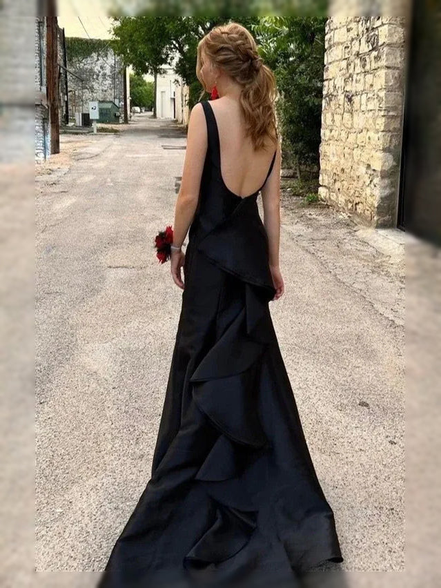 Black satin backless mermaid prom dress with draped tiered ruffle detail