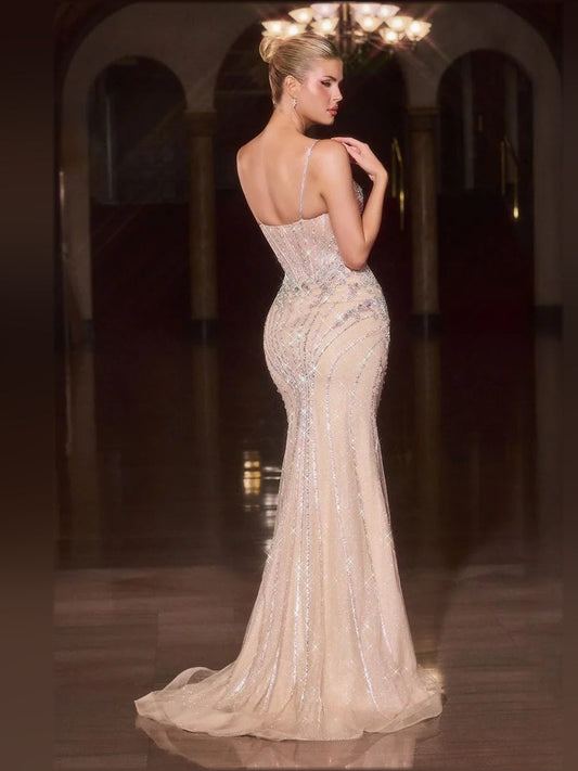 Champagne beaded mermaid prom dress with spaghetti straps, low back and tulle hem