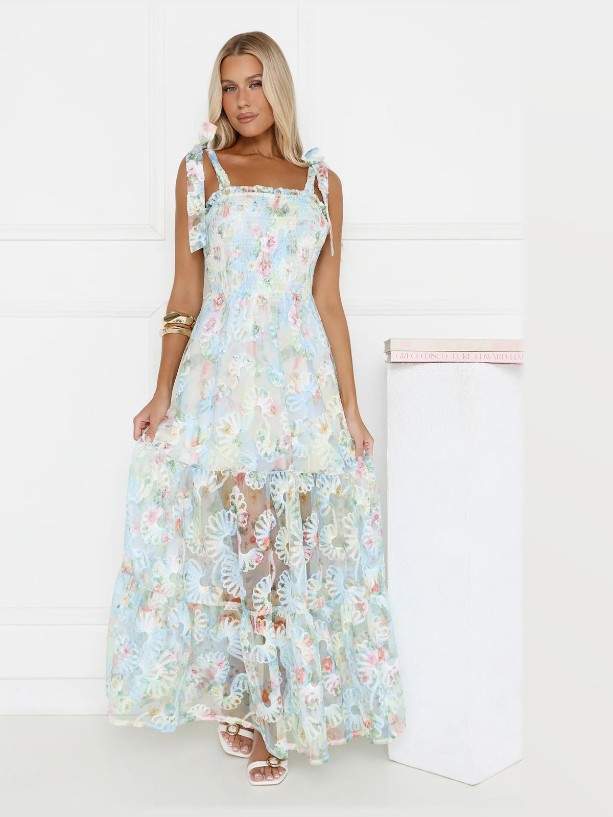 Silver formal dress with a-line silhouette and maxi length