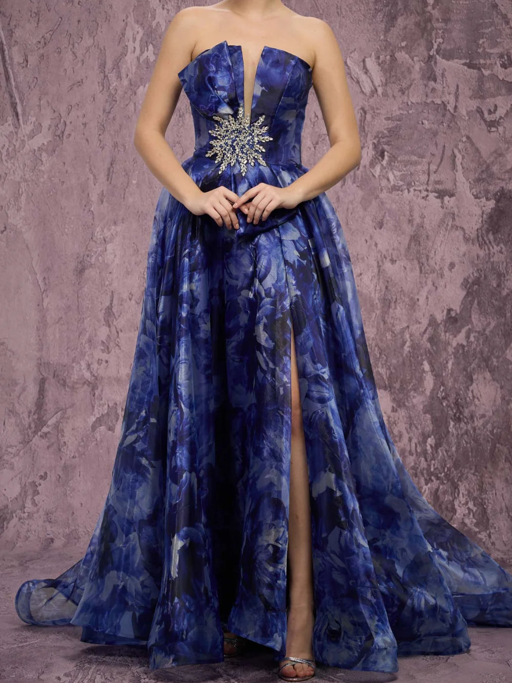 Navy strapless formal dress with embellished floral bodice and flowing full skirt