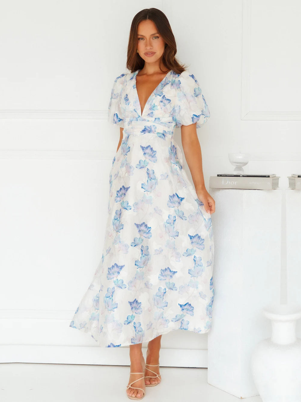 Blue a-line maxi formal dress with V-neckline, full-length front view