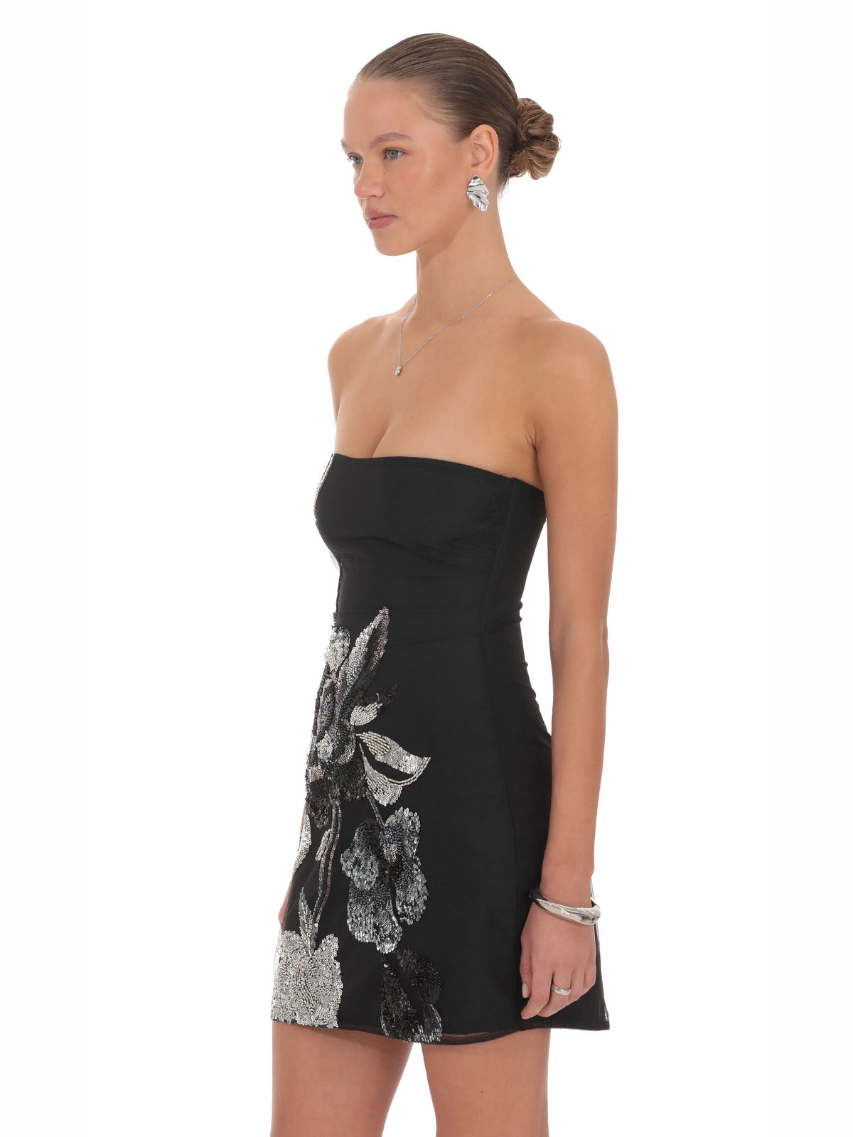 Black homecoming dress with a-line silhouette and mini length