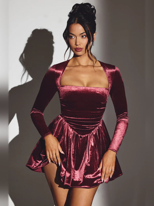 Wine velvet corset-style mini dress with long sleeves, square neckline, ruched waist.