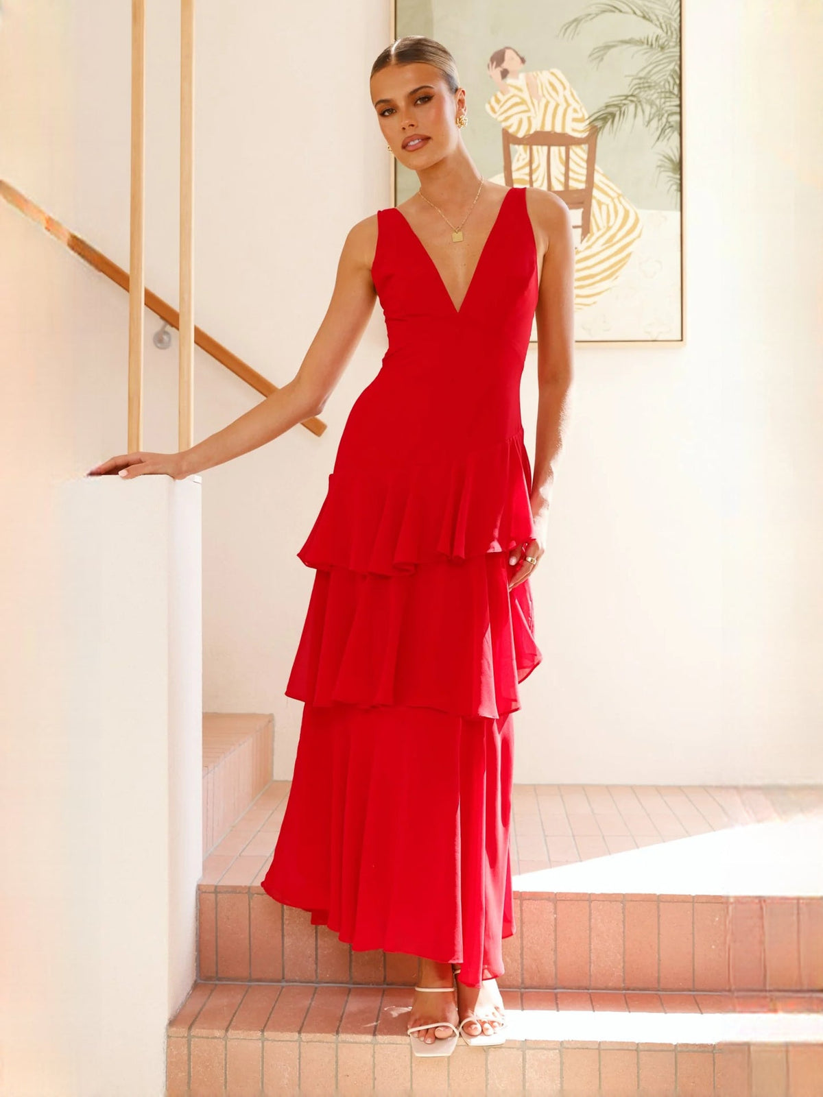 Red a-line maxi formal dress with V-neckline, full-length front view