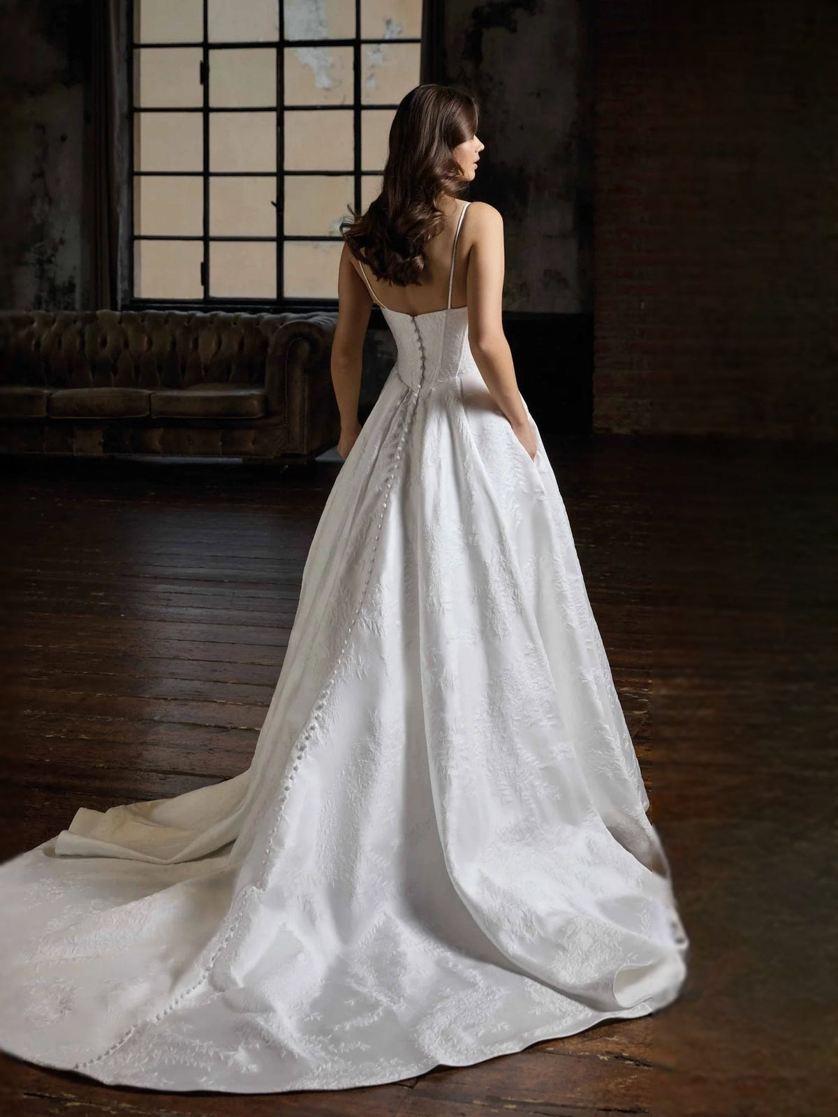 Ivory satin ball-gown wedding dress, beaded corset back and full floor-length skirt