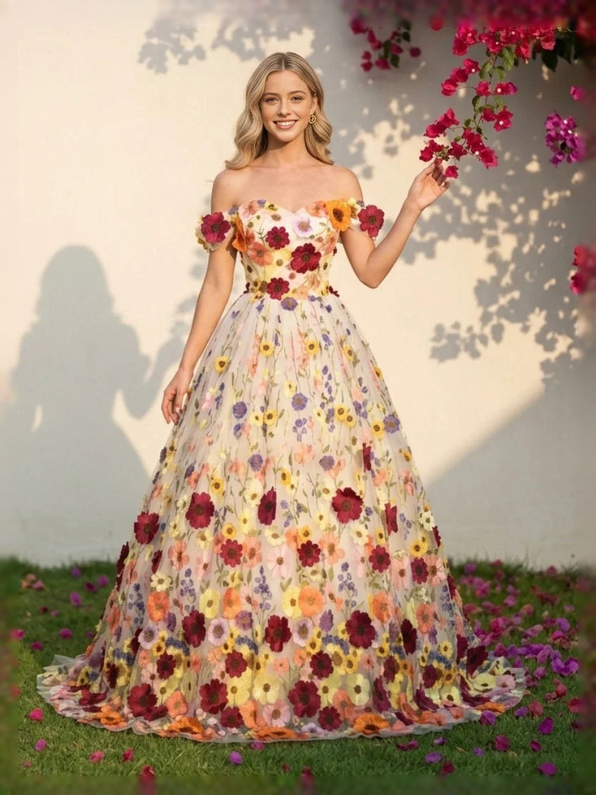 Ivory tulle A-line wedding dress with sweetheart neckline and floral applique bodice