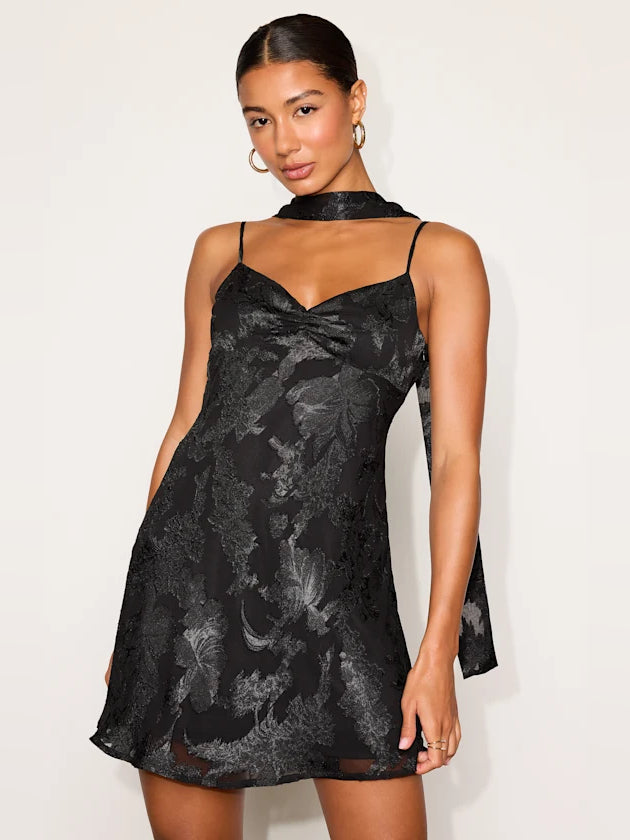 Black floral mini homecoming dress with halter neck and bow-front bodice