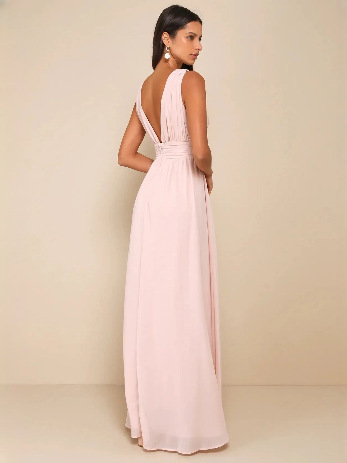 Light pink A-line maxi dress with V-neck, ruched waist, pleated skirt, side slit