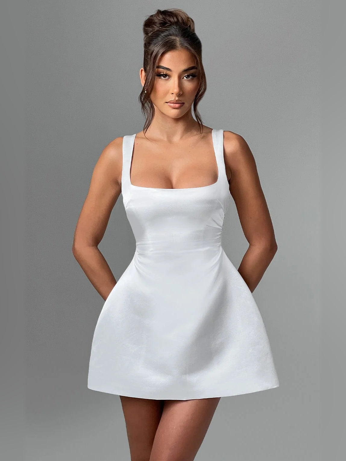Ivory mini homecoming dress with square neckline and thin spaghetti straps