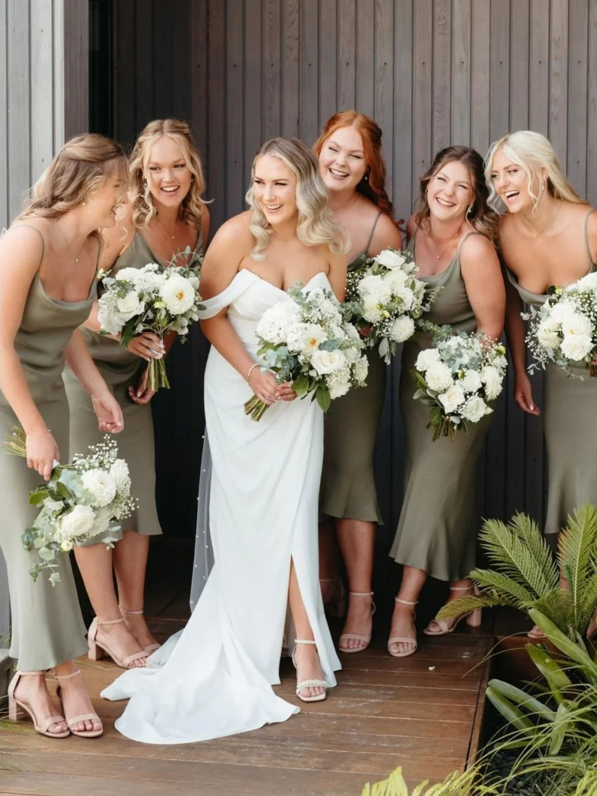 Olive satin cowl-neck A-line tea-length dress, sleeveless with draped bodice.