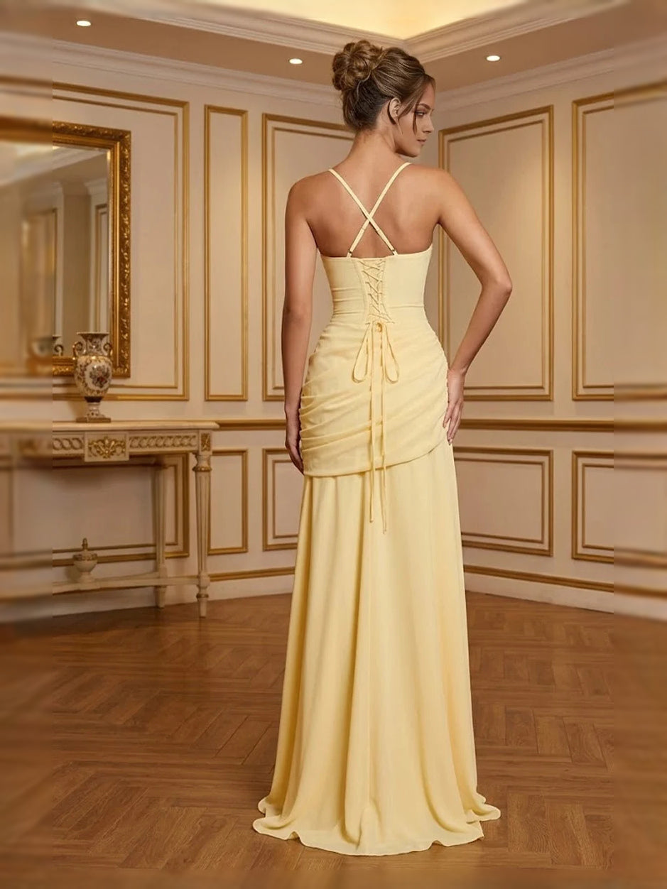 Pale lemon square-neck A-line prom dress, back view with crisscross straps