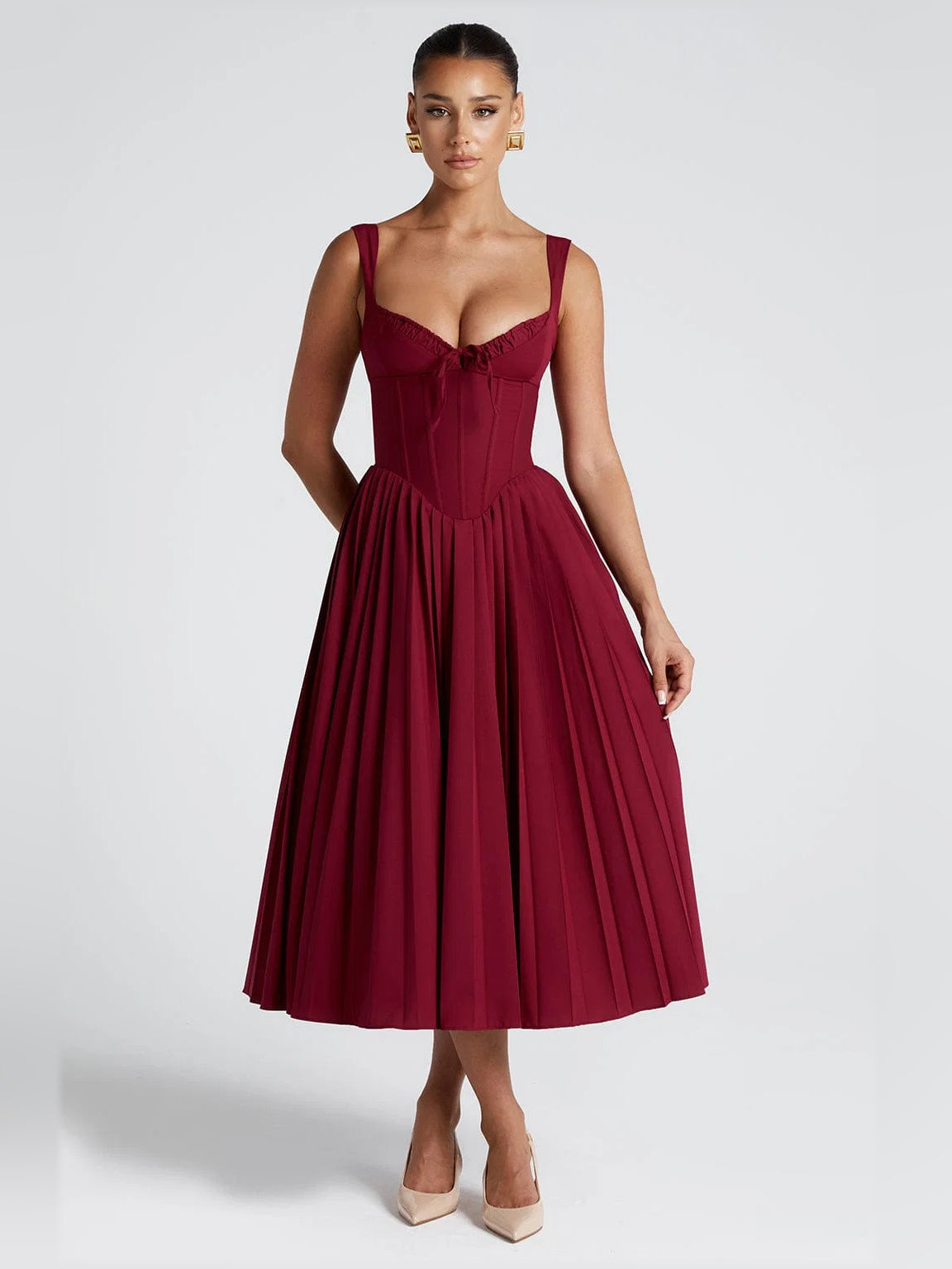 Berry midi formal dress with ruched bodice, bow straps, and pleated skirt
