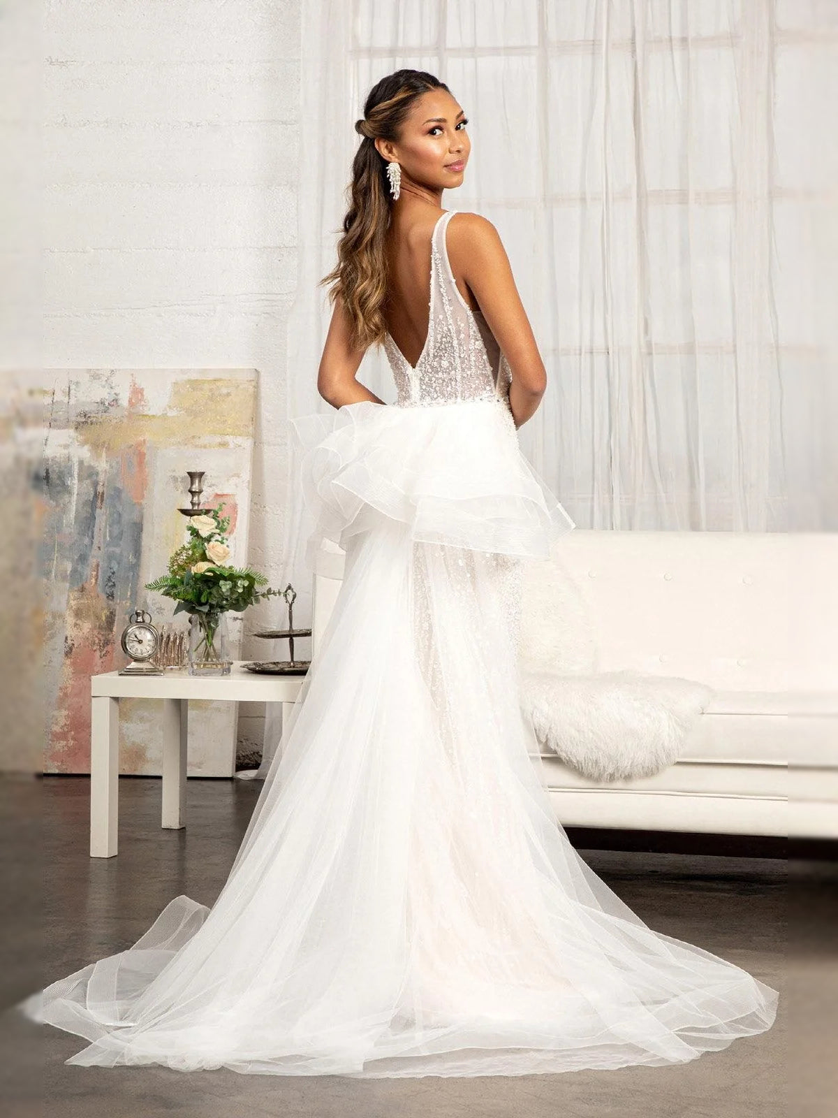 Ivory V-neck mermaid wedding dress with sparkling lace bodice and layered tulle skirt