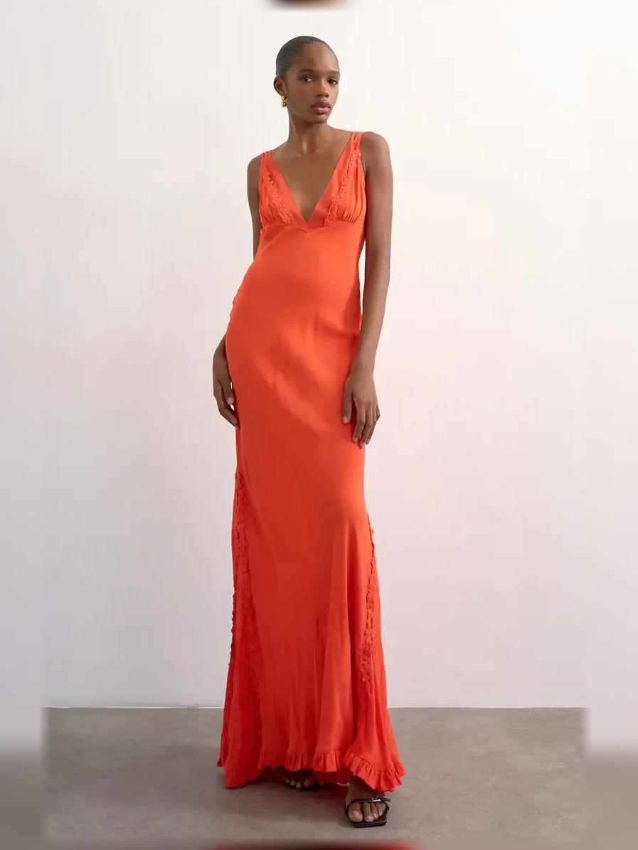 Orange V-neck spaghetti strap ruffle floor-length formal dress, sleeveless with flowy hem.