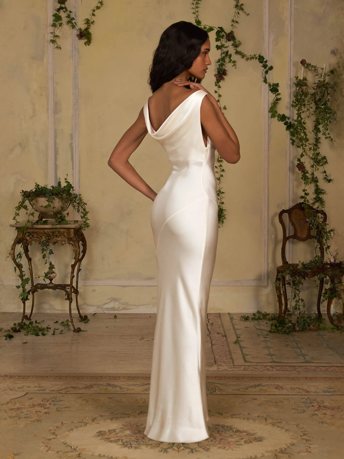 Ivory satin sheath maxi dress with cowl neckline, sleeveless, open back detail