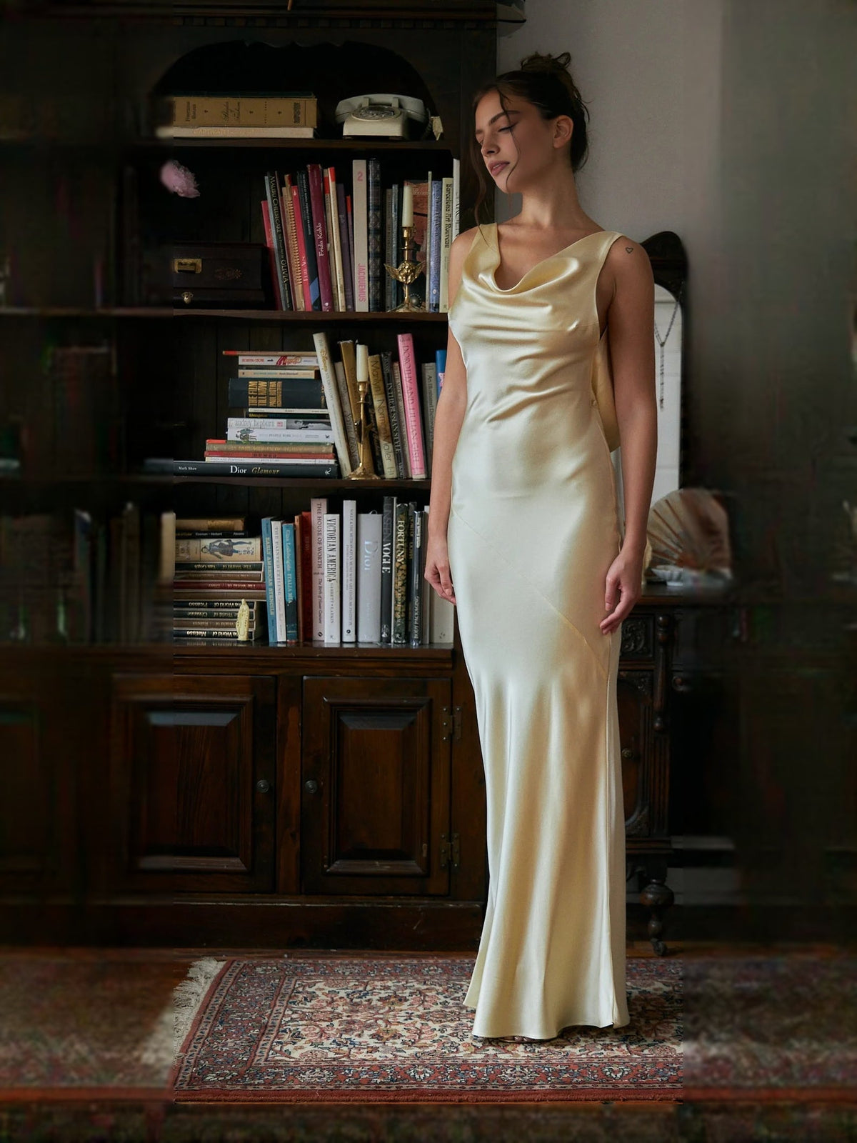 Ivory satin mermaid prom dress with draped cowl neckline, sleeveless.