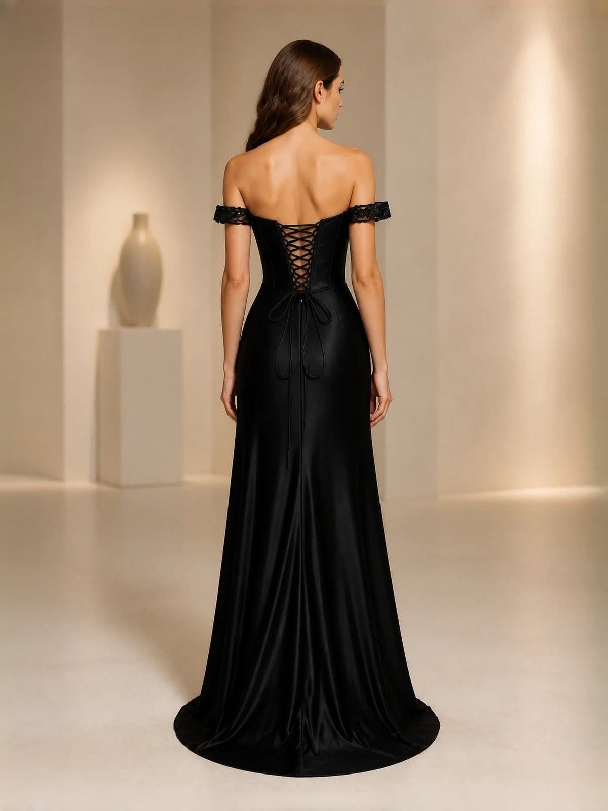 Black off-shoulder A-line satin prom dress with ruched back and floor-length drape