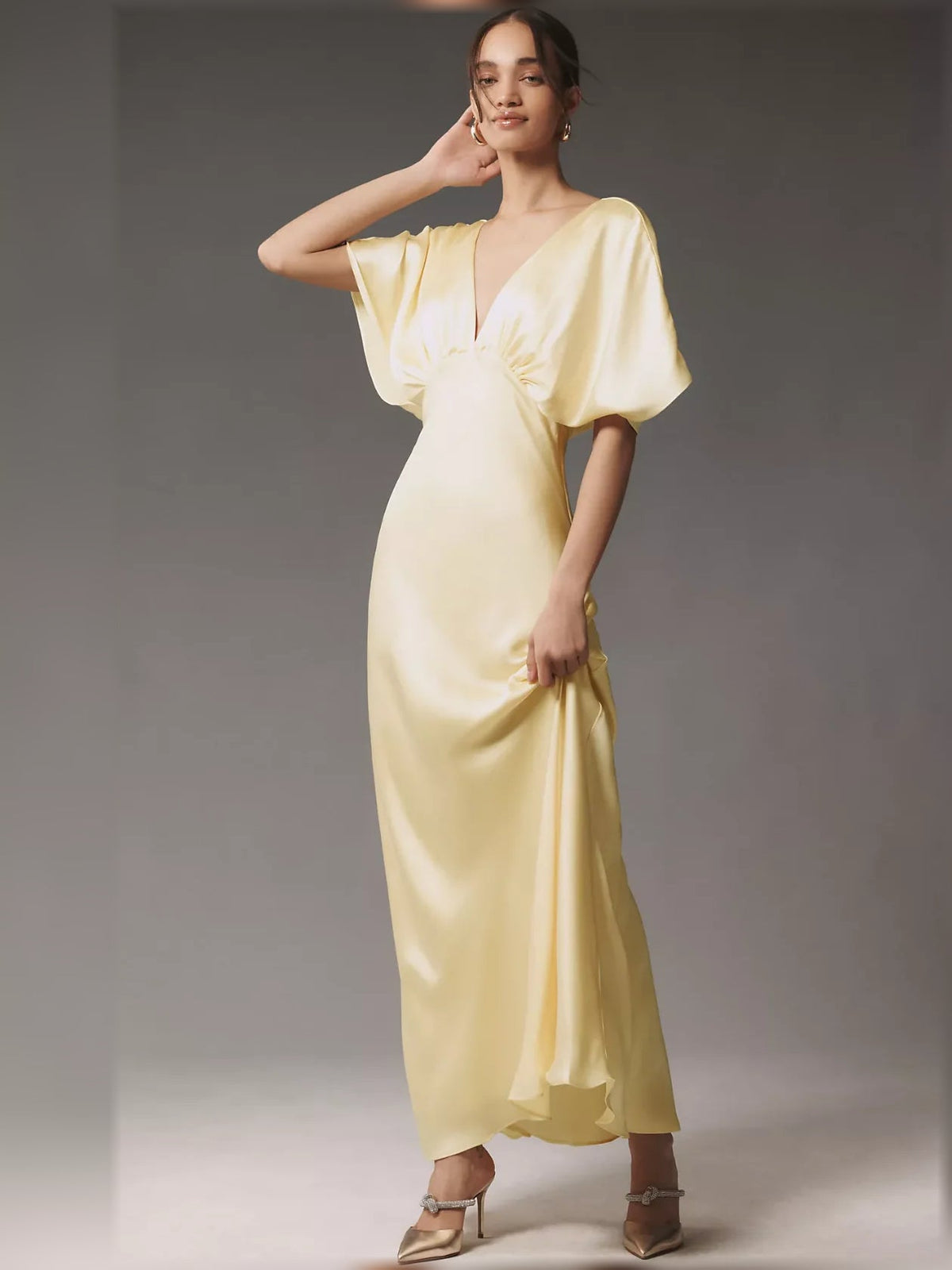 Pale lemon satin V-neck column maxi dress with short batwing sleeves and ruched waist
