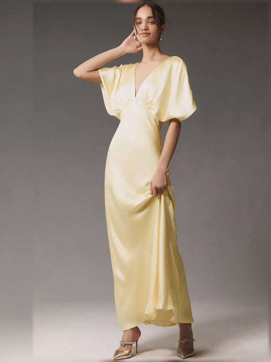 Pale lemon satin V-neck column maxi dress with short batwing sleeves and ruched waist