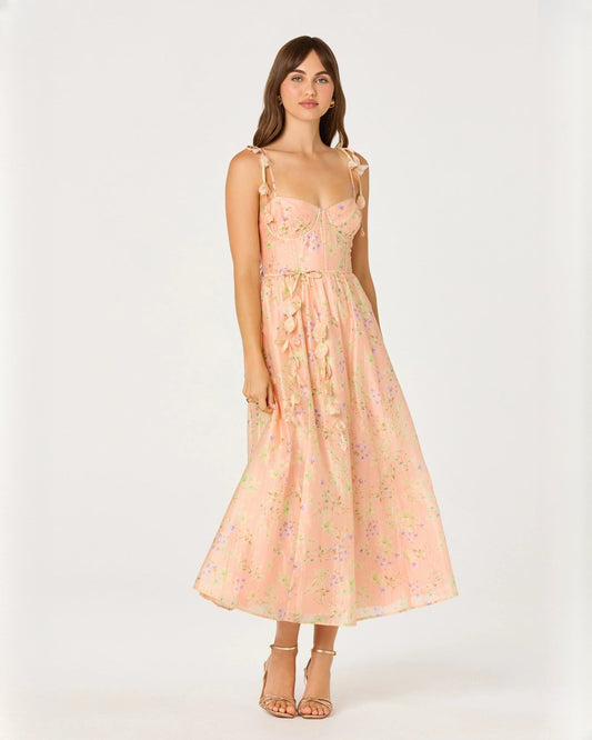 Peach chiffon A-line midi dress with sleeveless bow-tied straps and floral print
