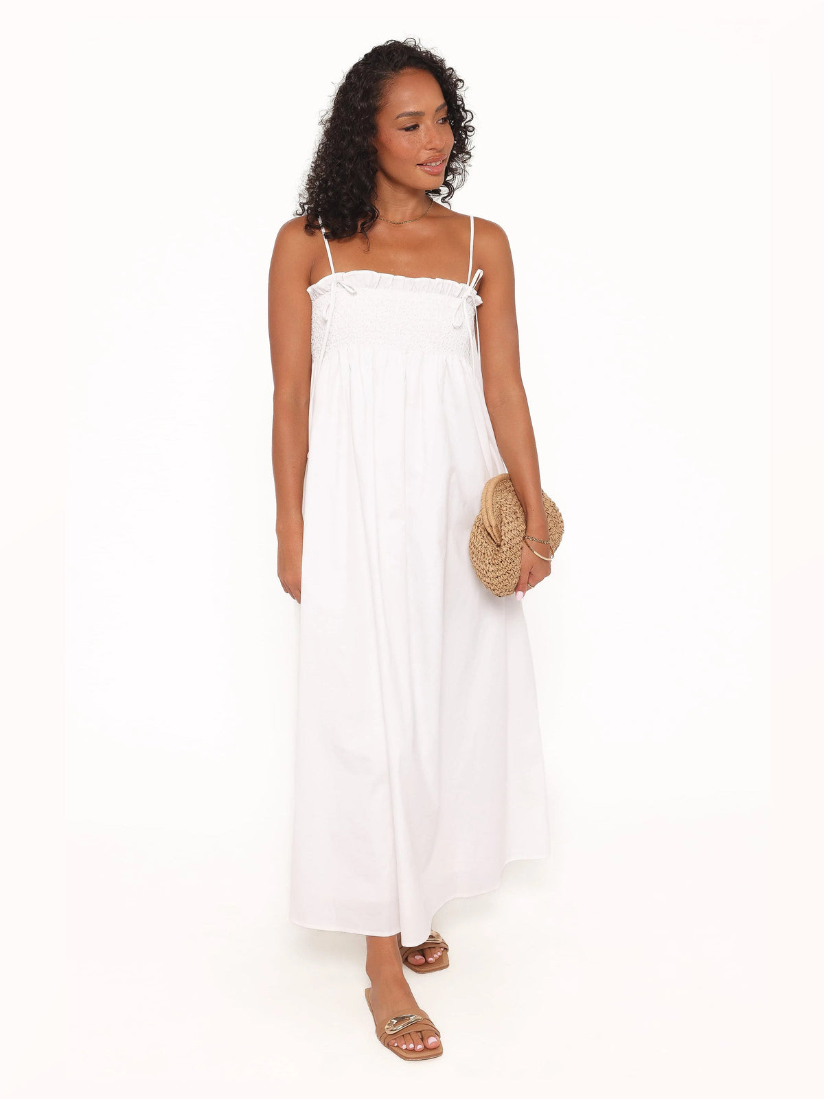White formal dress with a-line silhouette and maxi length