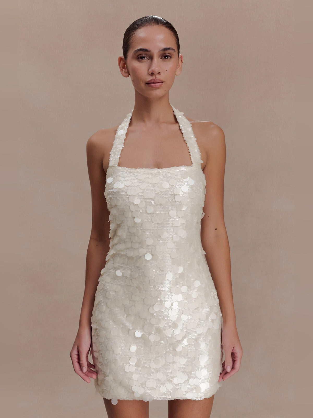 Ivory sequin halter-neck mini dress with square neckline and sleeveless bodice
