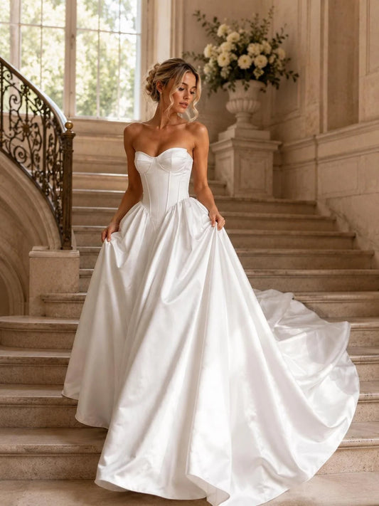 Ivory satin strapless sweetheart corset ball-gown with full pleated skirt, floor length
