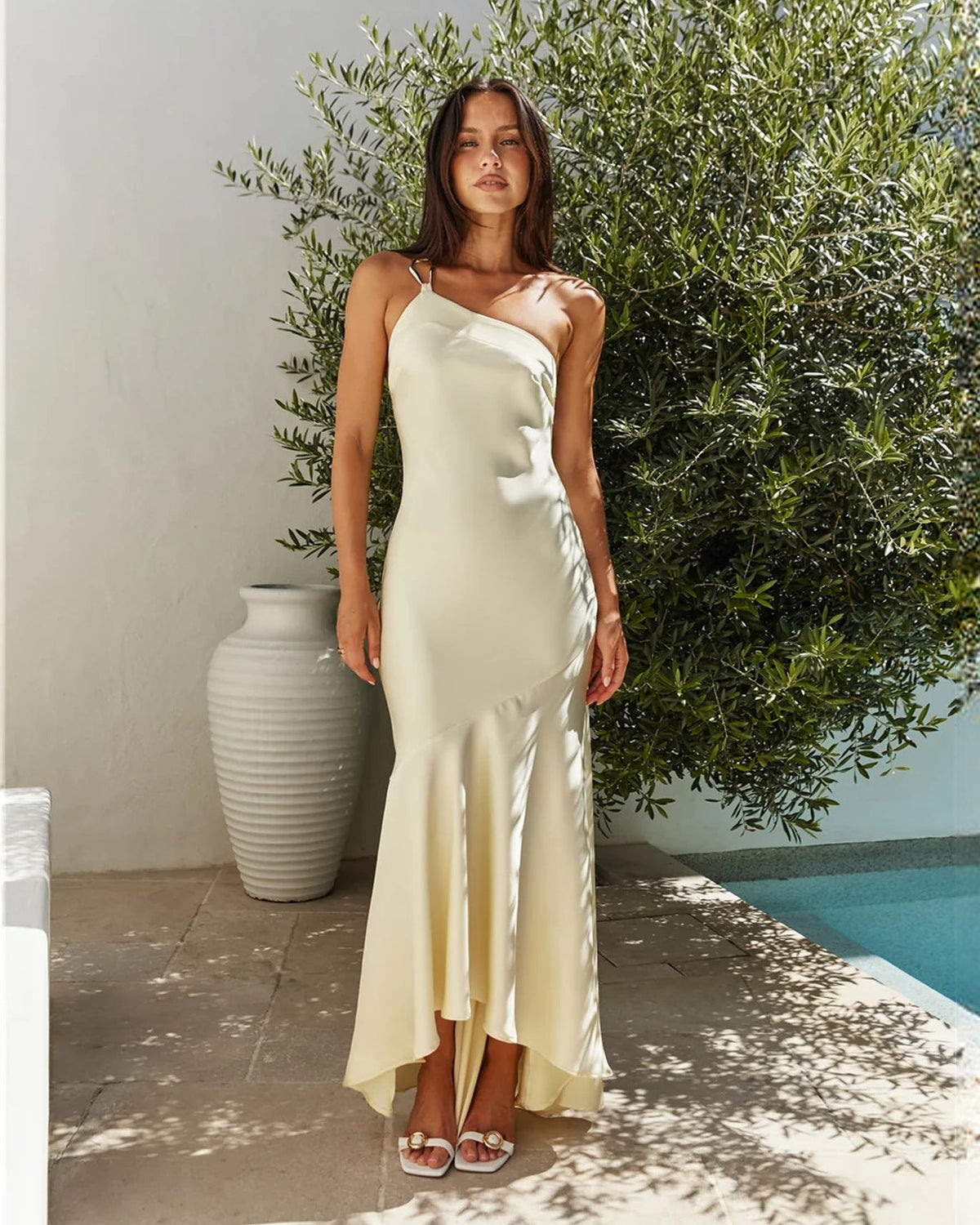 One-shoulder satin A-line maxi bridesmaid dress in pale yellow, draped bodice and midi-slit hem
