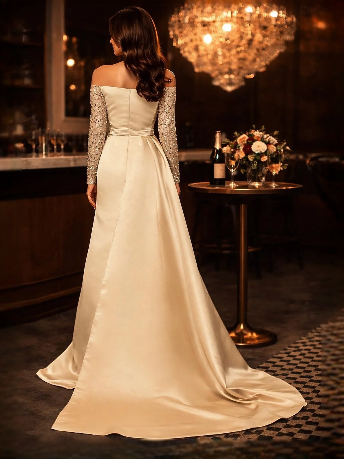 Gold satin off-shoulder maxi dress with ruched back and long sequin sleeves